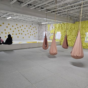 Space Club - Hanging swings and a pit with inflated stars. - Indoor Playcenter Near Me - Brooklyn, New York Space Club - Hanging swings and a pit with inflated stars. - Indoor Playcenter Near Me - Brooklyn, New York