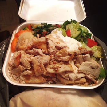 Amara - a tray of food with chicken, rice, and vegetables - Lebanese Near Me - Saint-Laurent, Quebec Amara - a tray of food with chicken, rice, and vegetables - Lebanese Near Me - Saint-Laurent, Quebec