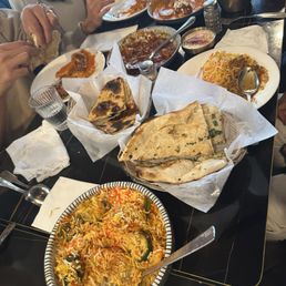 Biryani, naan, Garlic Curry, Malai Kofta / Kofta Curry, Dal Makhani