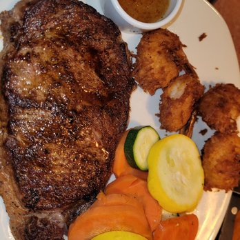 Outback Steakhouse - Ribeye and coconut shrimp with mixed veggies - Steakhouses Near Me - Woodbridge, Virginia Outback Steakhouse - Ribeye and coconut shrimp with mixed veggies - Steakhouses Near Me - Woodbridge, Virginia