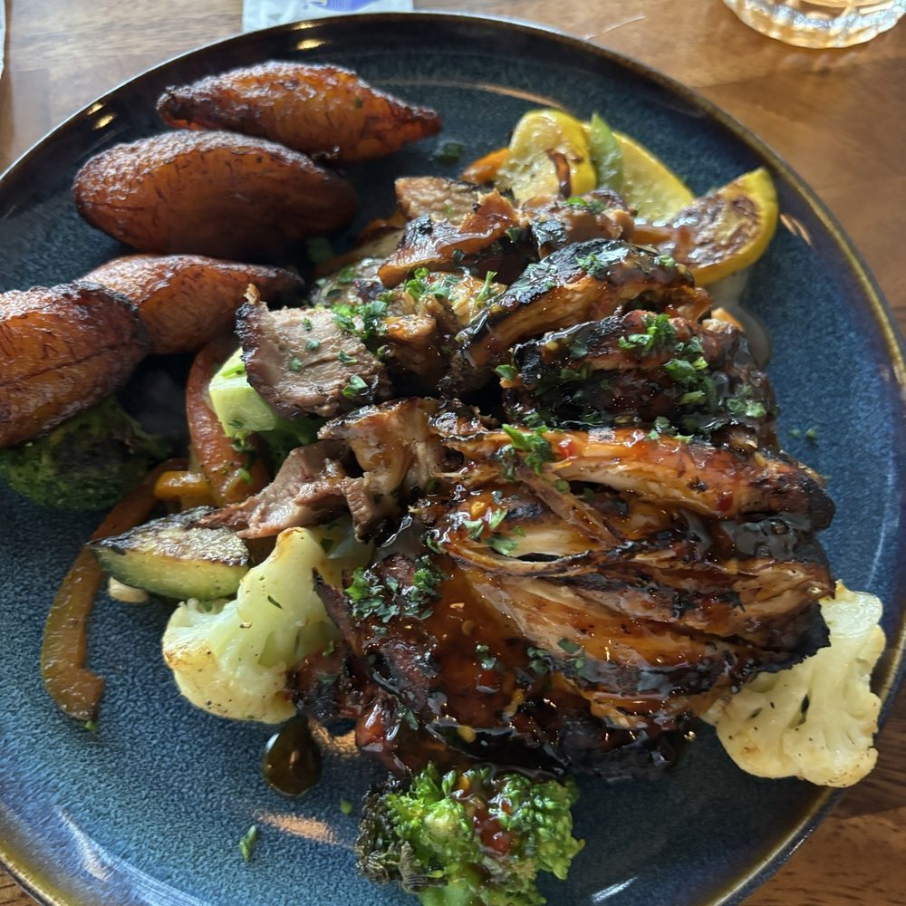 Bacchanal Junction - Jerk chicken with veggies and plantain - Bars Near Me - Bloomfield, New Jersey Bacchanal Junction - Jerk chicken with veggies and plantain - Bars Near Me - Bloomfield, New Jersey