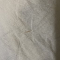 Blood stains on sheets. Picture is bad quality.