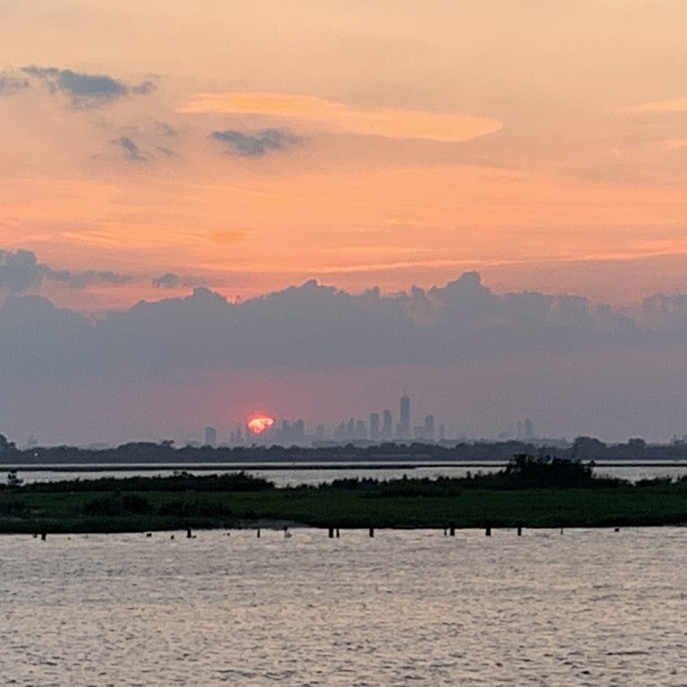 C&C Jerkbox - a sunset over a body of water - Caribbean Near Me - Queens, New York