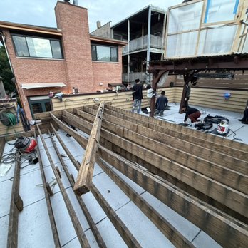 Skyline Roofing Solutions - Full Granulated Modified Roof System Completed Over Garage Rooftop Deck - Roofing Near Me Skyline Roofing Solutions - Full Granulated Modified Roof System Completed Over Garage Rooftop Deck - Roofing Near Me