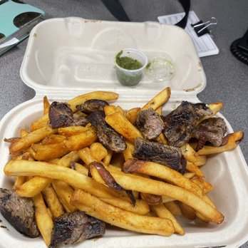 Arepa - Steak with fries & chimichurri sauce - Food Trucks Near Me - Olympia, Washington Arepa - Steak with fries & chimichurri sauce - Food Trucks Near Me - Olympia, Washington