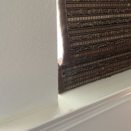 Large gap - letting light in despite being a black out shade Large gap - letting light in despite being a black out shade