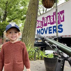 Solidarity Movers - It's a family thing! This little fella was happy to get in on the action with his family's move to Park Slope.
