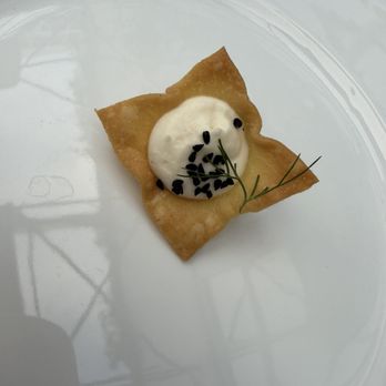 Spago - Crispy chip with whipped topping, sesame, and herb. - New American Near Me - Beverly Hills, California