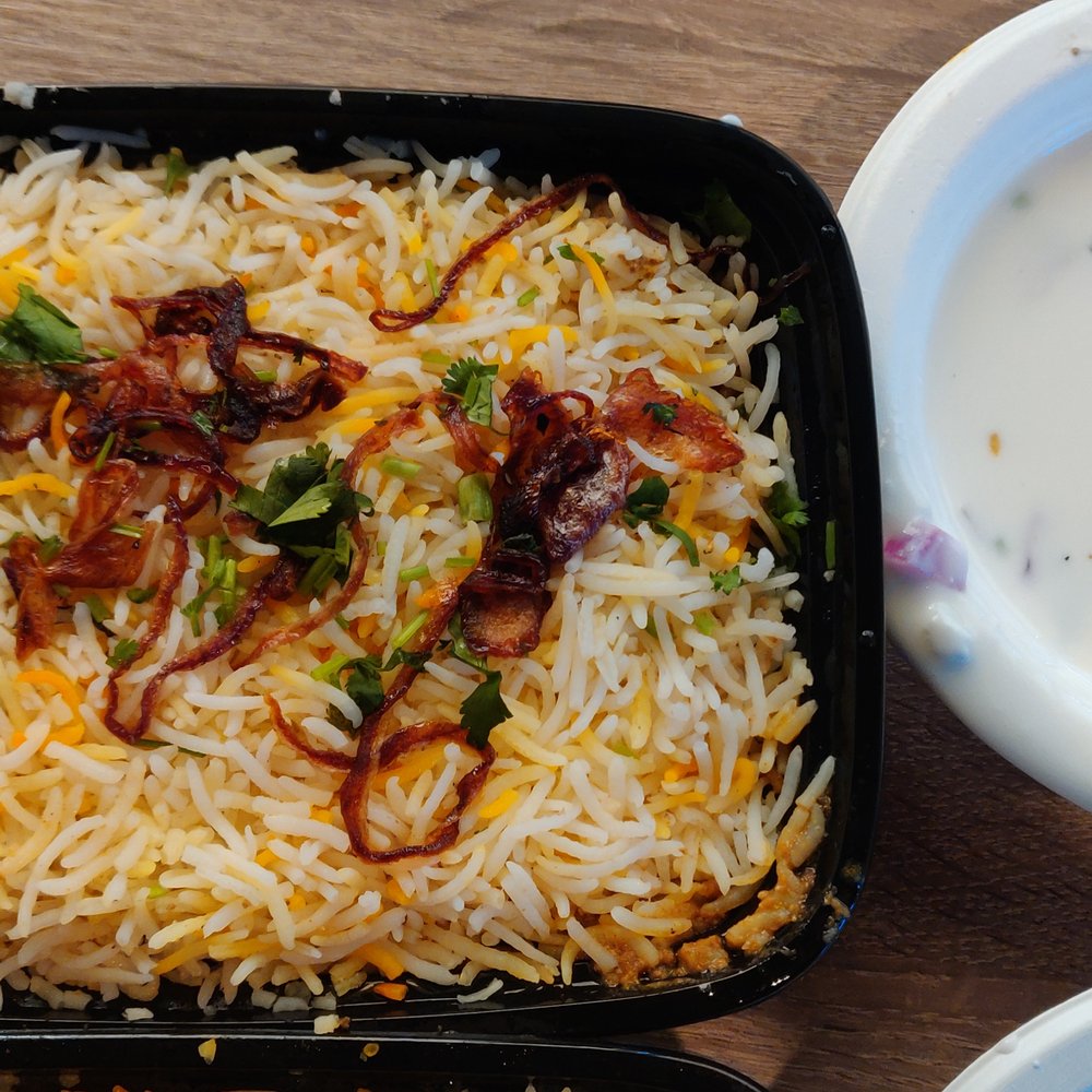 Biryaniz - a bowl of rice and a bowl of yogurt - Indian Near Me - Dublin, California Biryaniz - a bowl of rice and a bowl of yogurt - Indian Near Me - Dublin, California