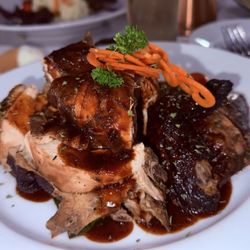 The Icon Restaurant and Lounge - Jerk Chicken & Jollof Rice and cabbage