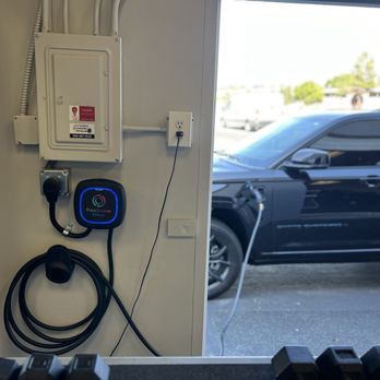 Eric's Lighting and Electrical Service - My car charging via the EV port installation. - Electricians Near Me Eric's Lighting and Electrical Service - My car charging via the EV port installation. - Electricians Near Me