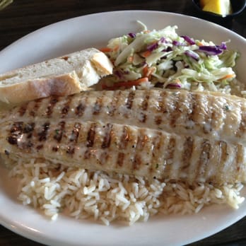 California Fish Grill - I always get this... White fish (swai) with garlic butter sauce and rice. - Seafood Near Me - Brea, California California Fish Grill - I always get this... White fish (swai) with garlic butter sauce and rice. - Seafood Near Me - Brea, California