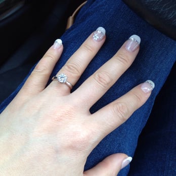 Jasmine Spa Nails - Pretty glitter and  flower on my ring finger for my wedding. - Nail Salons Near Me - Pasadena, California