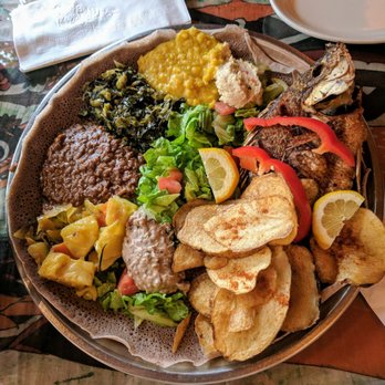 Cafe Colucci - Veggie sampler combined with the fried tilapia + potatoes plate. YUM. - Ethiopian Near Me - Oakland, California Cafe Colucci - Veggie sampler combined with the fried tilapia + potatoes plate. YUM. - Ethiopian Near Me - Oakland, California