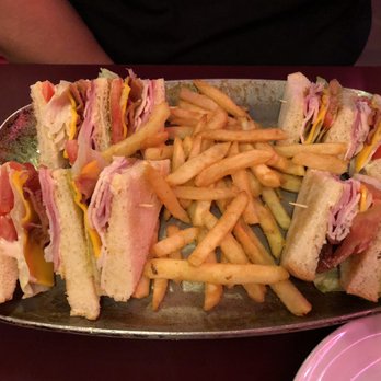Rogers Roost - The club sandwich with fries. - Pizza Near Me - Sterling Heights, Michigan Rogers Roost - The club sandwich with fries. - Pizza Near Me - Sterling Heights, Michigan