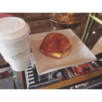 Cavu Coffee - London Fog in that cup (made with Earl Grey) and a breakfast sammie (didn't catch the name of it). Both things are delicious. - Coffee & Tea Near Me - West Chester, Ohio