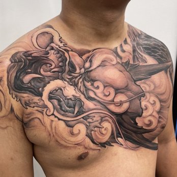 Red Blossom Art - Chest piece by Twenty - Tattoo Near Me - Garden Grove, California