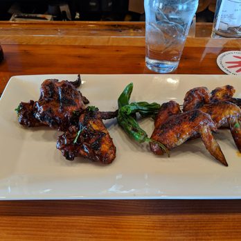 Session Room - Grilled Wings Michigan Sauce (blueberry sweeter flavor) on left , Texas sauce (Mild bold flavor) on right. - Beer Bar Near Me - Ann Arbor, Michigan Session Room - Grilled Wings Michigan Sauce (blueberry sweeter flavor) on left , Texas sauce (Mild bold flavor) on right. - Beer Bar Near Me - Ann Arbor, Michigan