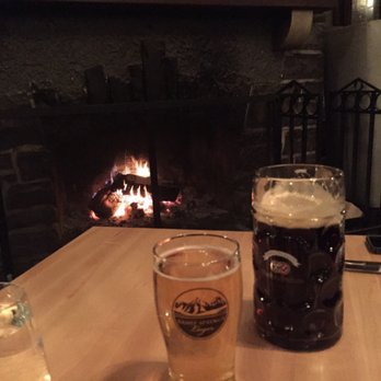 WALDHAUS - Beer in front of the fireplace. Doesn't get any better! - Pubs Near Me - Banff, Alberta WALDHAUS - Beer in front of the fireplace. Doesn't get any better! - Pubs Near Me - Banff, Alberta