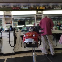 Fletcher Plaza Barber & Style Shop - Great 'ole fashioned barber shop, James Lamb gives an awesome cut for $13.00.