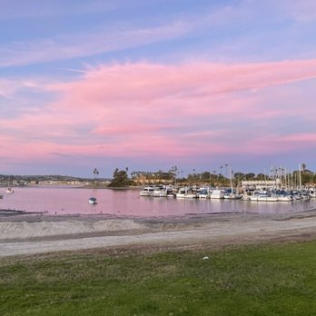 Bahia Resort Hotel - View of the hotel across Santa Barbara cove at sunset. - San Diego, CA