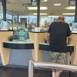 PLS Check Cashers - One lane open with 6 workers
