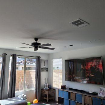 Luminor Electric - Living room - recessed lighting, ceiling fan, and mounted an 86" TV - Electricians Near Me