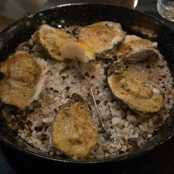 Pangea - Oysters on rock salt bed - New American Near Me - Dallas, Texas