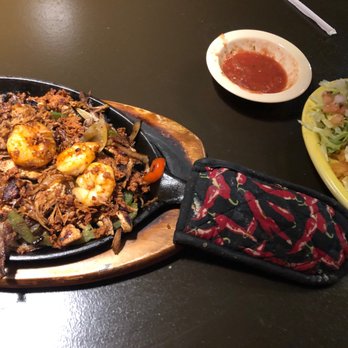 Salsa's Mexican Restaurant - Mixed fajitas (Parrillada) with chicken, beef and shrimp plus beans, rice, lettuce, pico, guacamole and sour cream & tortillas. - Salad Near Me - Dublin, Georgia Salsa's Mexican Restaurant - Mixed fajitas (Parrillada) with chicken, beef and shrimp plus beans, rice, lettuce, pico, guacamole and sour cream & tortillas. - Salad Near Me - Dublin, Georgia