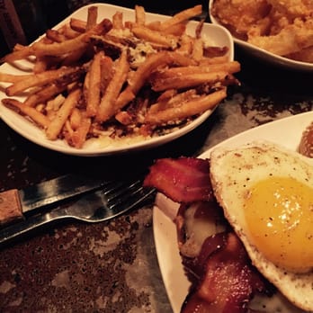 Flip Side - Hudson - Truffle fries and the onion rings on the right - Burgers Near Me - Hudson, Ohio