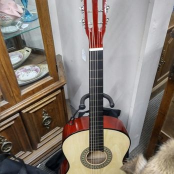 Logan Antique Mall - Modern low end beginners guitar. - Antiques Near Me - Logan, Ohio Logan Antique Mall - Modern low end beginners guitar. - Antiques Near Me - Logan, Ohio