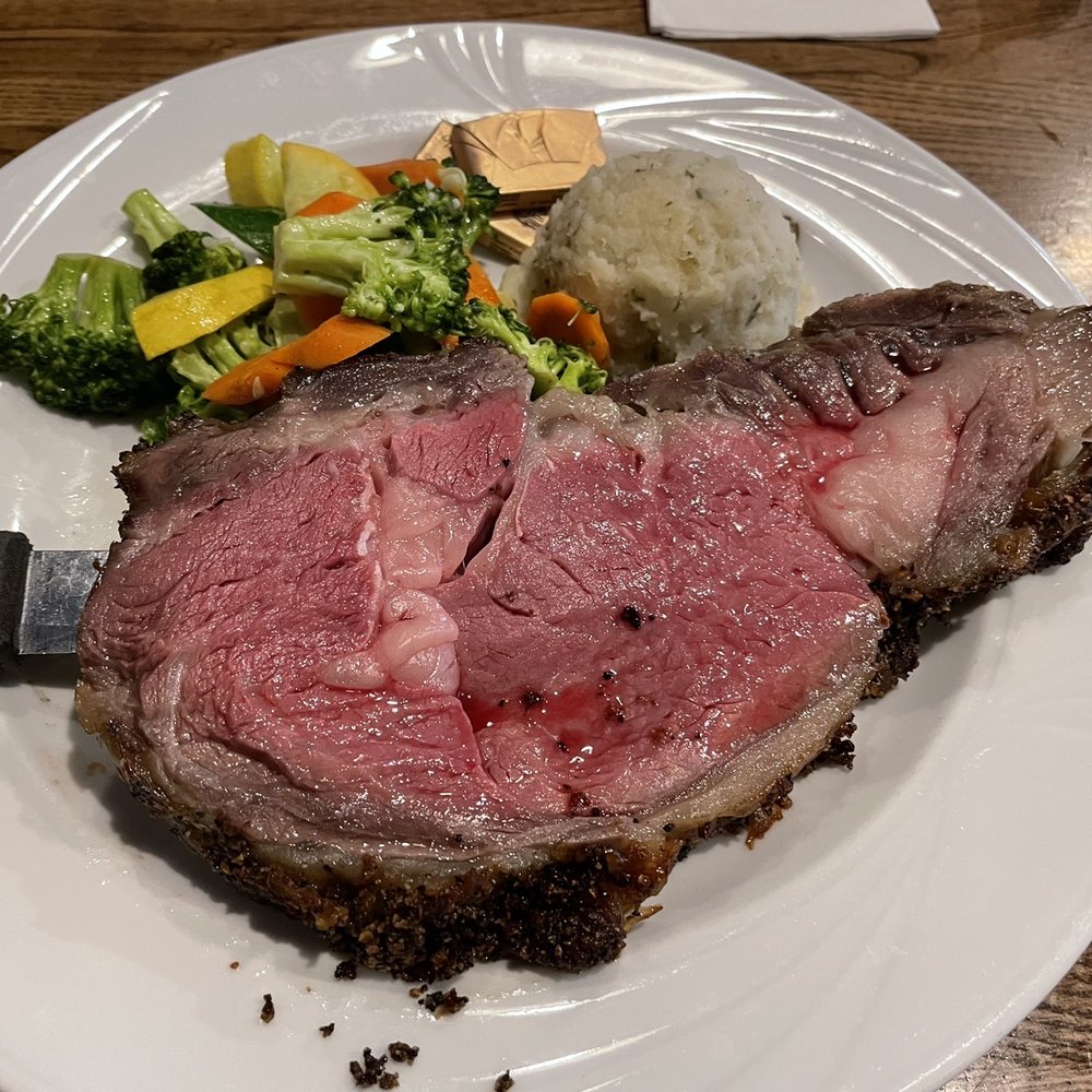 a plate of meat and vegetables a plate of meat and vegetables