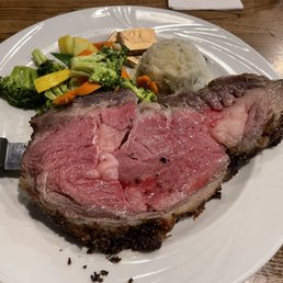 a plate of meat and vegetables a plate of meat and vegetables