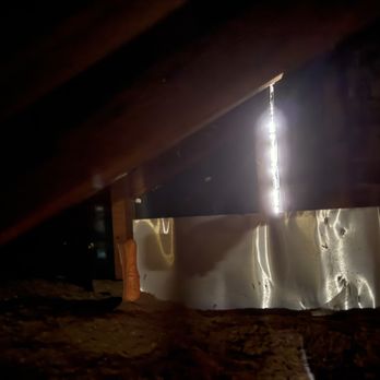 Rees Restoration - Other side of chimney from attic you can see outside - Roofing Near Me - Greenwood, Indiana