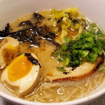 Ivan Ramen - TONKOTSU RAMEN: rich pork broth, shoyu-glazed chashu, woodear mushrooms, pickled mustard greens, soft egg, and mayu ($19) - Ramen Near Me - New York, New York