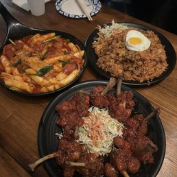 Spicy rice cakes, sweet and spicy chicken wings, kimchi fried rice Spicy rice cakes, sweet and spicy chicken wings, kimchi fried rice