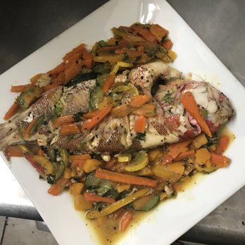 El Pilon - a plate of fish and vegetables - Dominican Near Me - Kearny, New Jersey
