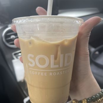 Solid Coffee Roasters - Vanilla bean w/ oat milk latte on ice - Coffee Roasteries Near Me - Artesia, California Solid Coffee Roasters - Vanilla bean w/ oat milk latte on ice - Coffee Roasteries Near Me - Artesia, California