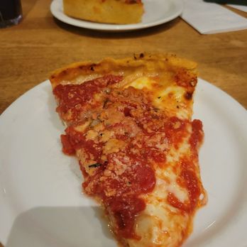 Lou Malnati's Pizzeria - Malnati Chicago Classic Deep Dish slice - Pizza Near Me - Schaumburg, Illinois Lou Malnati's Pizzeria - Malnati Chicago Classic Deep Dish slice - Pizza Near Me - Schaumburg, Illinois