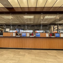 teller left the window to again ask manager a question ridiculous