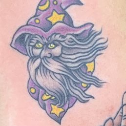 It's a purple yellow star hat wizard‍