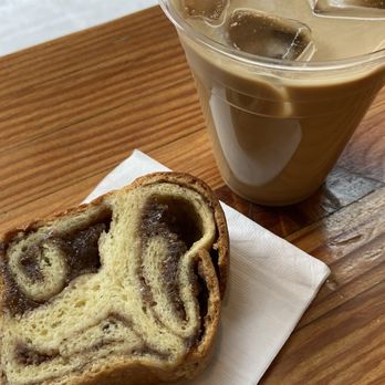 Ghost Note Coffee - Potica bread, Iced Latte w Tiki Spice Syrup (seasonal) - Coffee & Tea Near Me - Seattle, Washington Ghost Note Coffee - Potica bread, Iced Latte w Tiki Spice Syrup (seasonal) - Coffee & Tea Near Me - Seattle, Washington