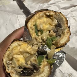 Yung's Carry Out - Half Size Chicken cheese steak w/added peppers onions mushrooms extra cheese.
