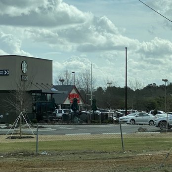 Starbucks - cars parked in front of a starbucks coffee shop - Coffee & Tea Near Me - Laurinburg, North Carolina Starbucks - cars parked in front of a starbucks coffee shop - Coffee & Tea Near Me - Laurinburg, North Carolina