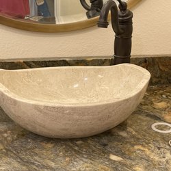 Amazon Stone - Master bath counter tops.  Blue fire!