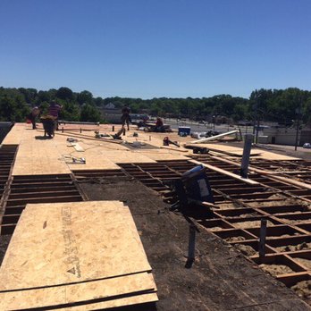 Trusty Roofing - Installation of new plywood in crossover apartments - Roofing Near Me Trusty Roofing - Installation of new plywood in crossover apartments - Roofing Near Me
