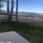 Photo of Tioga Gas Mart & Whoa Nellie Deli - Lee Vining, CA, United States. View from the outdoor tables on the grass