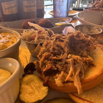 Salt + Smoke - Pulled pork sandwich with cream corn - Bars Near Me - Saint Louis, Missouri Salt + Smoke - Pulled pork sandwich with cream corn - Bars Near Me - Saint Louis, Missouri