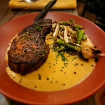 LATHA - Jerked Pork Chop on tamarind jus (not as sour as expected); the pork chop was beautifully seasoned - African Near Me - Phoenix, Arizona