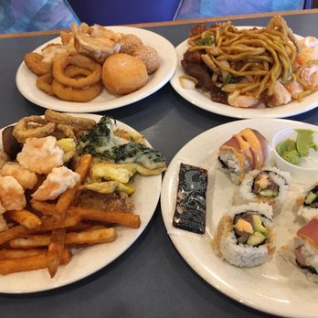 Grand Buffet - Mixtures of everything that they serve. They have more food that we couldn't fit on the plates - Buffets Near Me - Redding, California